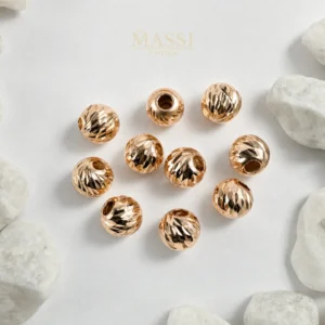Balines #7 Diamantados de 7 mm en oro nacional rosa, presentación de 10 unidades